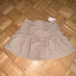 Free people tan mini skirt.